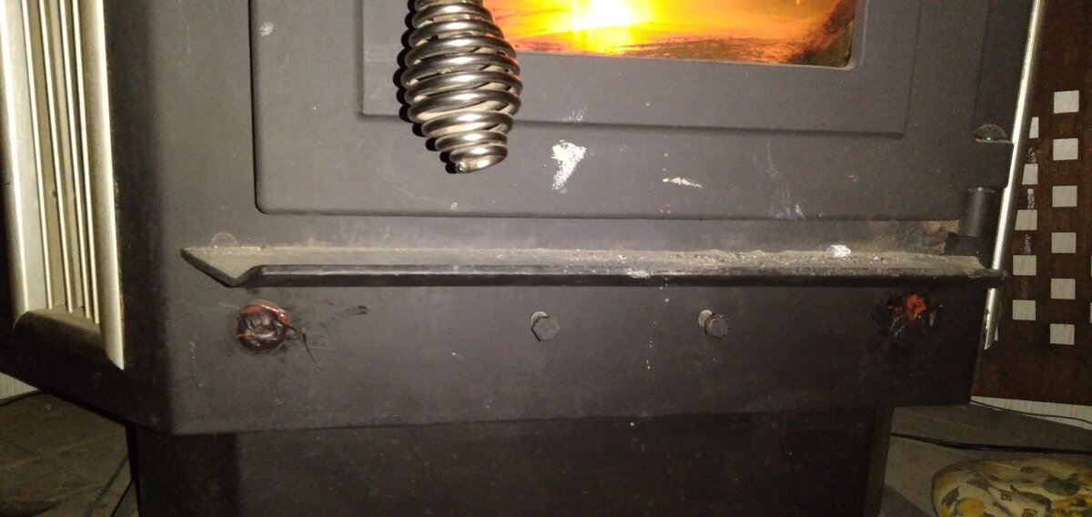 Sqaure holes to either side of the burn box tightening bolts? 25-pdv pellet stove