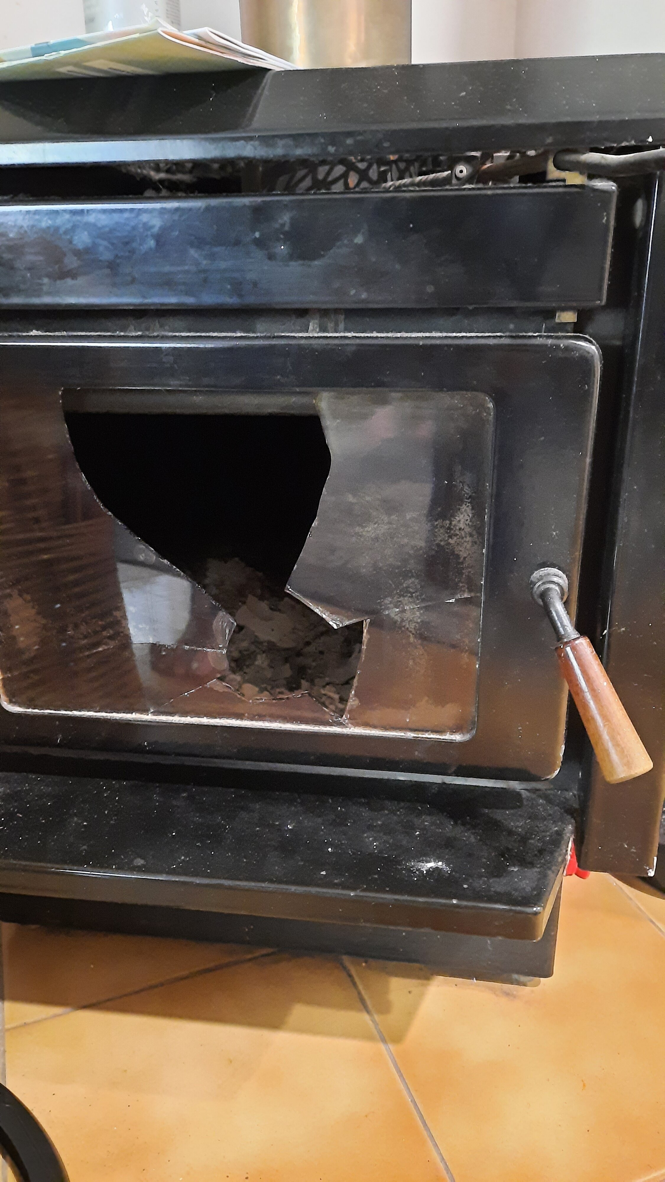 Need some advice about replacing the The glass door on my kent tile fire.  I accidentally smashed it while doing some work. How can I get it replaced?