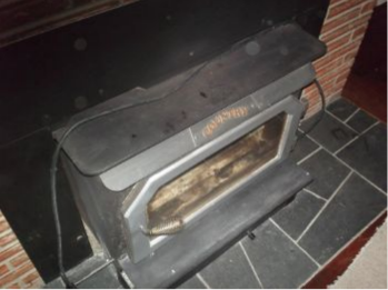 Can anyone ID this Country brand wood stove?