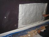 Neighbor's fireplace is cooking my wall -- how hot is too hot?