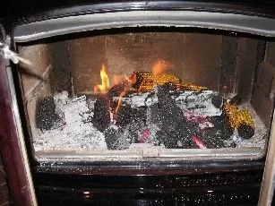 [Hearth.com] who heats with Wood and coal in same stove?