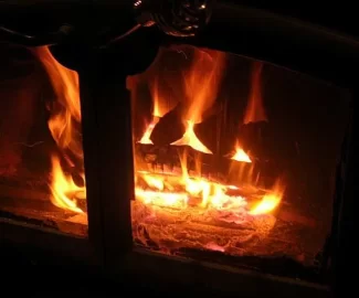 [Hearth.com] What happens when you throw a lump of coal on your wood stove?