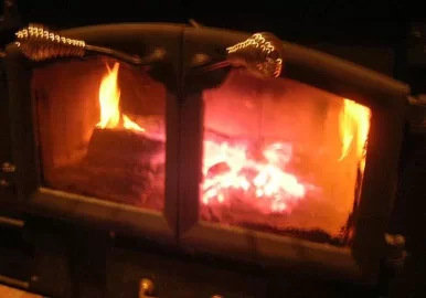 [Hearth.com] What happens when you throw a lump of coal on your wood stove?