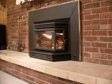 [Hearth.com] Been waiting to post my Osburn2200i install so I could tell how I like it.  GREAT STOVE, WE LOVE IT!