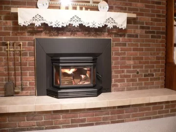 [Hearth.com] Been waiting to post my Osburn2200i install so I could tell how I like it.  GREAT STOVE, WE LOVE IT!