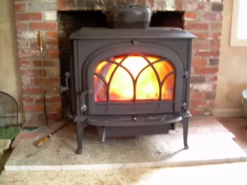 [Hearth.com] Photo of my Jotul Oslo in action, plus my woodpile