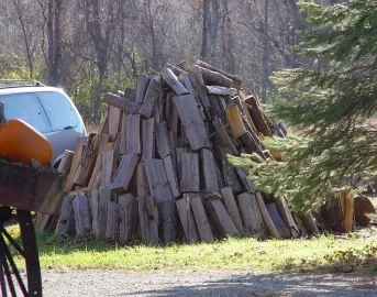 [Hearth.com] Wood stacked vertically.