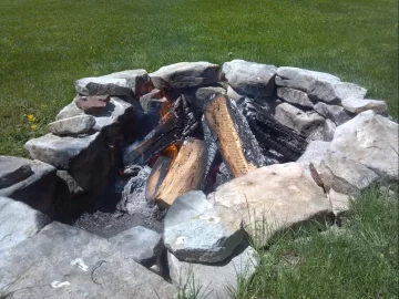 [Hearth.com] New York Strips on applewood = one happy family!!