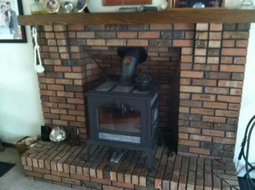 [Hearth.com] Brick mason out today maybe a stove change