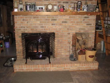 [Hearth.com] Brick mason out today maybe a stove change