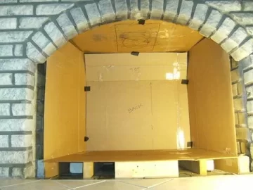 [Hearth.com] Added insulation to the liner and a block off plate...