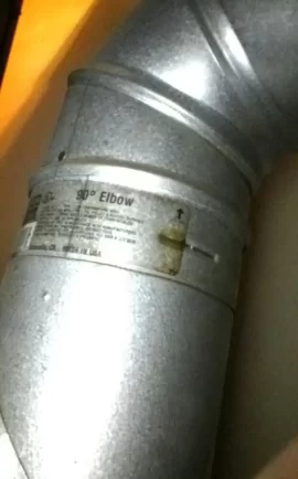 [Hearth.com] Pellet stove leaks smoke...pipe installation right?