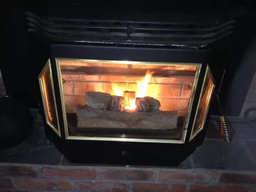 [Hearth.com] Englander 25-EPI black soot on glass.