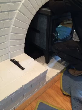 [Hearth.com] Painted brick outside fireplace a problem?