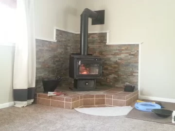 [Hearth.com] Need ideas for hearth and wall behind stoves.