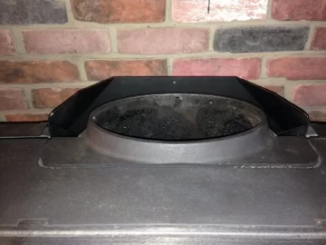 [Hearth.com] 8'' DVL Oval-to-Round Adapter - 8DVL-ORAD installation on a Vermont castings defiant