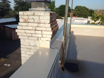 [Hearth.com] Could my TPO roof be in danger if flashed against chimney?