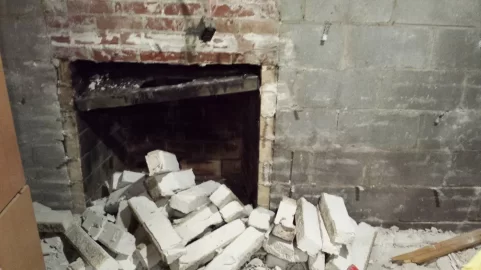 [Hearth.com] Insulating exterior basement wall around old brick fireplace