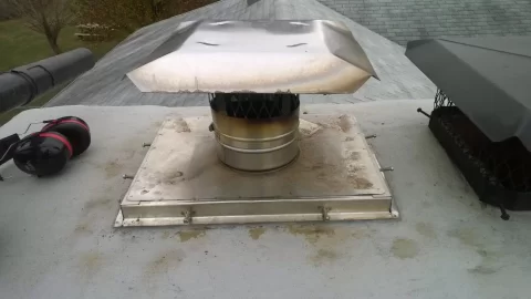 [Hearth.com] Creosote buildup on rain cap