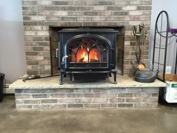 [Hearth.com] Freestanding Stove in Fireplace.