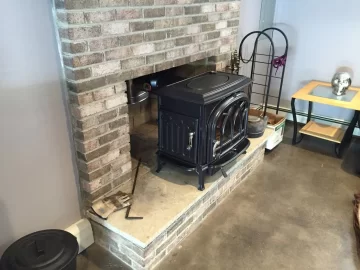 [Hearth.com] Freestanding Stove in Fireplace.