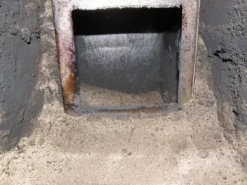 [Hearth.com] Mid season cleaning of wood boiler chimney