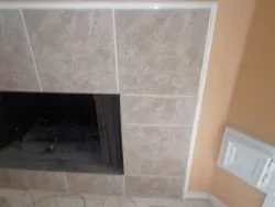 [Hearth.com] Can I cover the black "frame" around the fireplace?