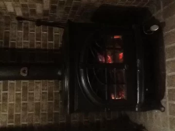 [Hearth.com] Photos of Pellet stoves at "full burn"