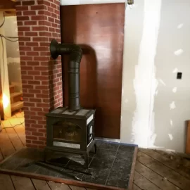 [Hearth.com] Copper wall shield installed