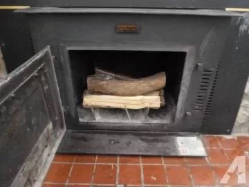 [Hearth.com] Burning thru grates burning wood/coal