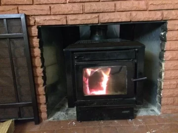 [Hearth.com] Wood stove in front of existing fireplace?