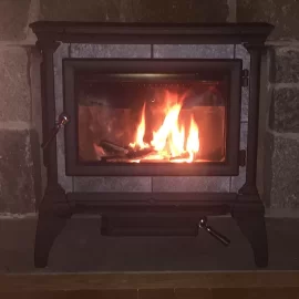 [Hearth.com] Wood stove in front of existing fireplace?