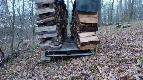 [Hearth.com] Wisdom/mechanics of stacking alongside a cinder block retaining wall