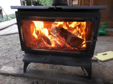 [Hearth.com] Older Fabco stove. Damper is wide open but the fire acts as if it's closed. Clogged?