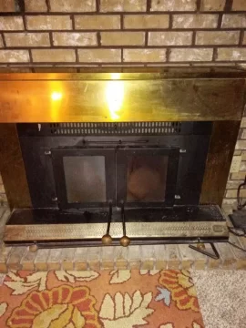 [Hearth.com] Fireplace Insert Glass Doors...Dirty Glass or Some Type of Metal??