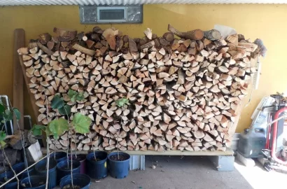 [Hearth.com] Wood Piled Against House