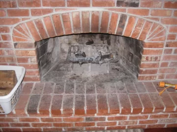 [Hearth.com] Method for opening up brick fireplace to accomodate an insert