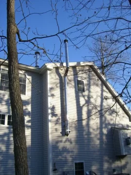 [Hearth.com] Sealing air gap around chimney in wall?