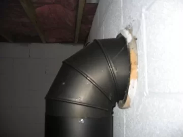 [Hearth.com] How to safely install basement insulation around stove pipe