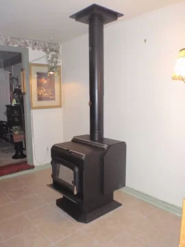 [Hearth.com] Here's the finished installation of Mom's wood stove