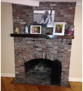 [Hearth.com] what all would be involved in getting a big freestanding woodstove into this fireplace?