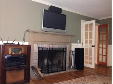 [Hearth.com] what all would be involved in getting a big freestanding woodstove into this fireplace?