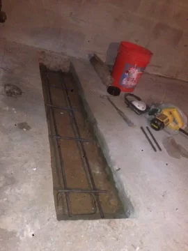 [Hearth.com] Can I frame a small knee wall on a concrete slab to reinforce floor joists?