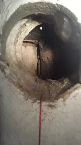 [Hearth.com] Masonry Thimble coming through wall at angle?