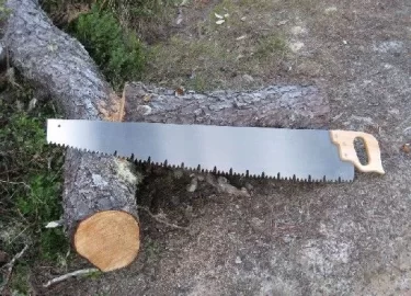 [Hearth.com] chopping logs for wood stove with an axe