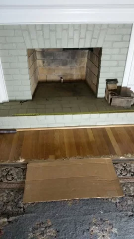 [Hearth.com] Freestanding stove install venting through masonry fireplace.