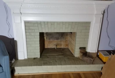 [Hearth.com] Freestanding stove install venting through masonry fireplace.