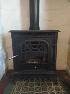 [Hearth.com] Can anyone identify this unusual wood fire make and model?