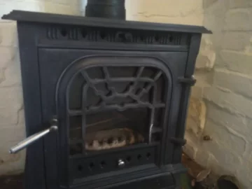 [Hearth.com] Can anyone identify this unusual wood fire make and model?