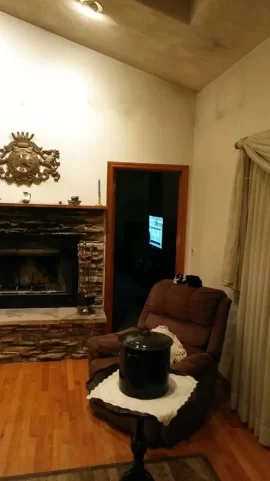 [Hearth.com] Wall above fireplace gets black soot. How to prevent?